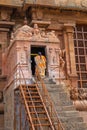 Devotee entering a Hindu shrine in tamil Nadu